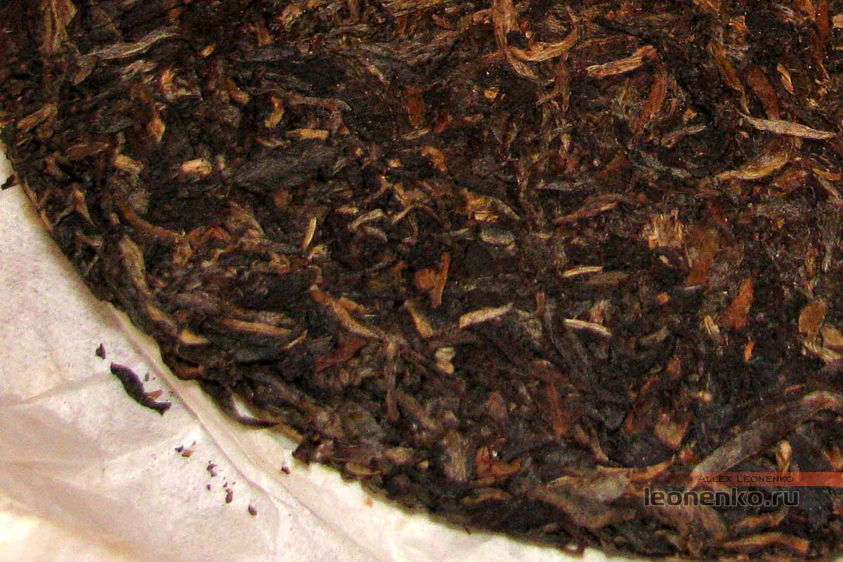 «Олимпийский» шен 2007 года от чайной фабрики Куньмин (Lai Chi Village Olympic Tea) - чайный  блин